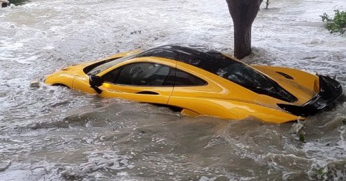 Hurricane Ian washes millionaire's £1million McLaren out of garage and down road