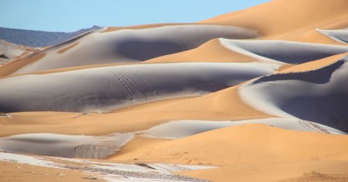 Snow falls across Sahara Desert in breathtaking photos of rare phenomenon
