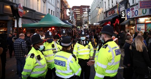 Boozy brits pack out pubs as fight breaks out 'over tabes' on first Friday out