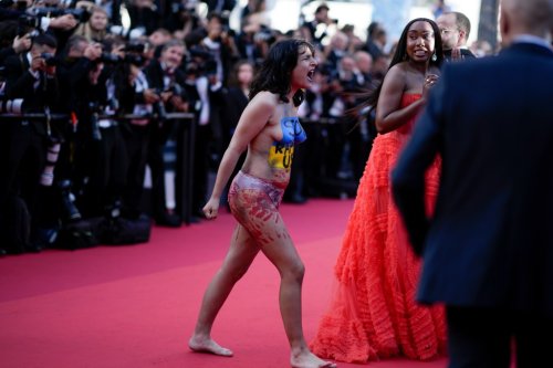 Activist Removed From Cannes Red Carpet Following Naked Protest Against Sexual Violence In Ukraine
