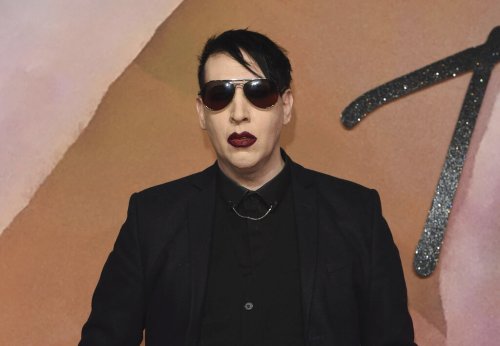 Marilyn Manson to surrender to officials on arrest warrant ...