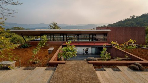 Curved roof tops weekend retreat near Pune by Red Brick Studio