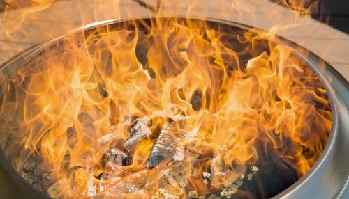 This Stainless Steel Fire Pit Burns Better With Less Smoke