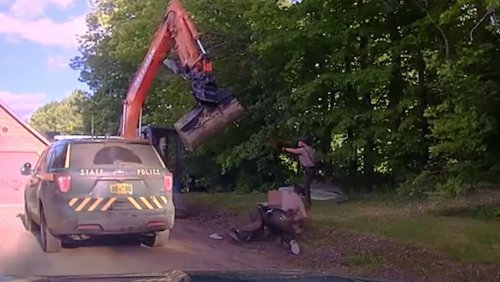 Man Attempts To Fight Police With An Excavator And The Footage Is Bonkers