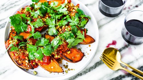 Crispy sweet potatoes with blistered cherry tomatoes and pistachios
