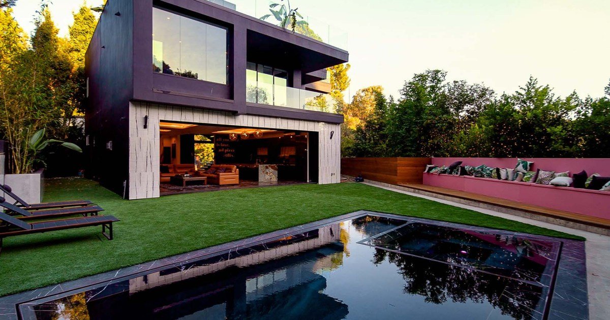 Inside a modern mansion full of art, automation, and open air