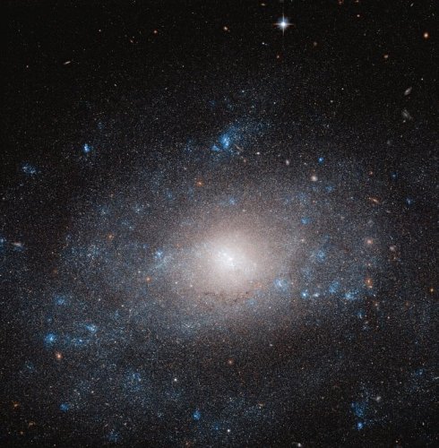 Hubble captures a galaxy that’s chock-full of dark matter