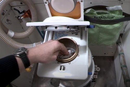 Watch a NASA astronaut show off the space station’s new toilet
