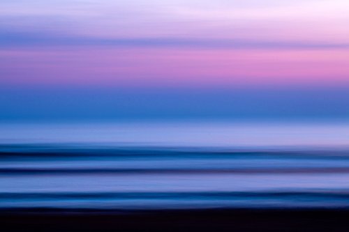 Create abstract art photographs with deliberate camera movement and slow shutter speeds