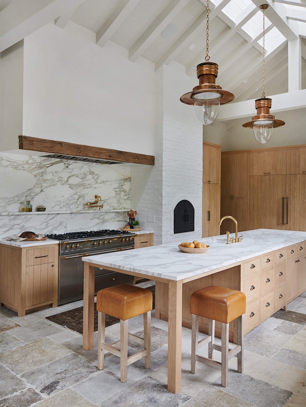 Beaded Doors and Hidden Drawers Elevate These Farmhouse Kitchen Islands