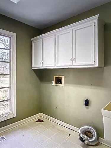 An Old English Laundry Room Reno That’s Still Extremely Practical