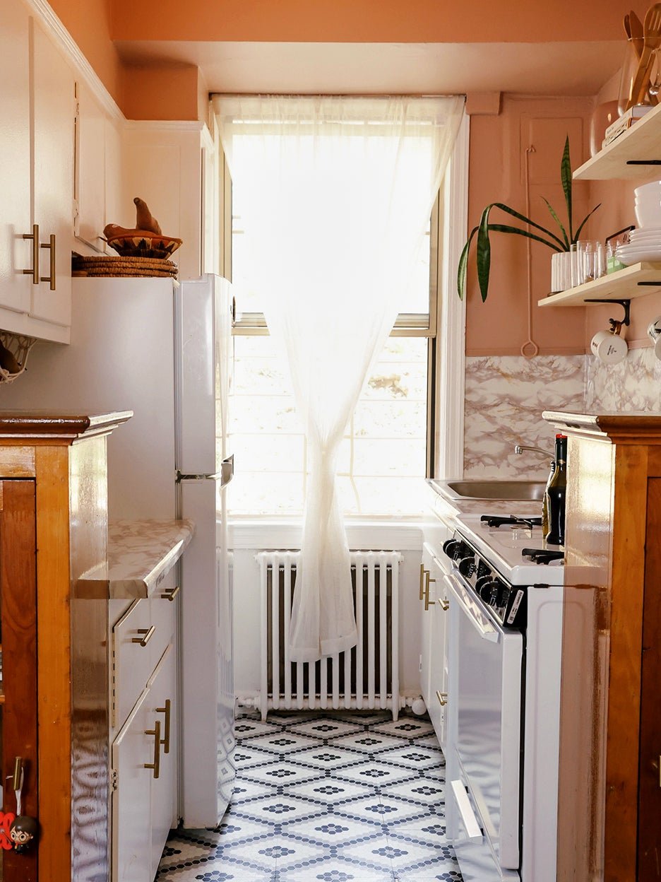 Pink Paint and Hardware Store Shelves Made This Rental Kitchen Unrecognizable