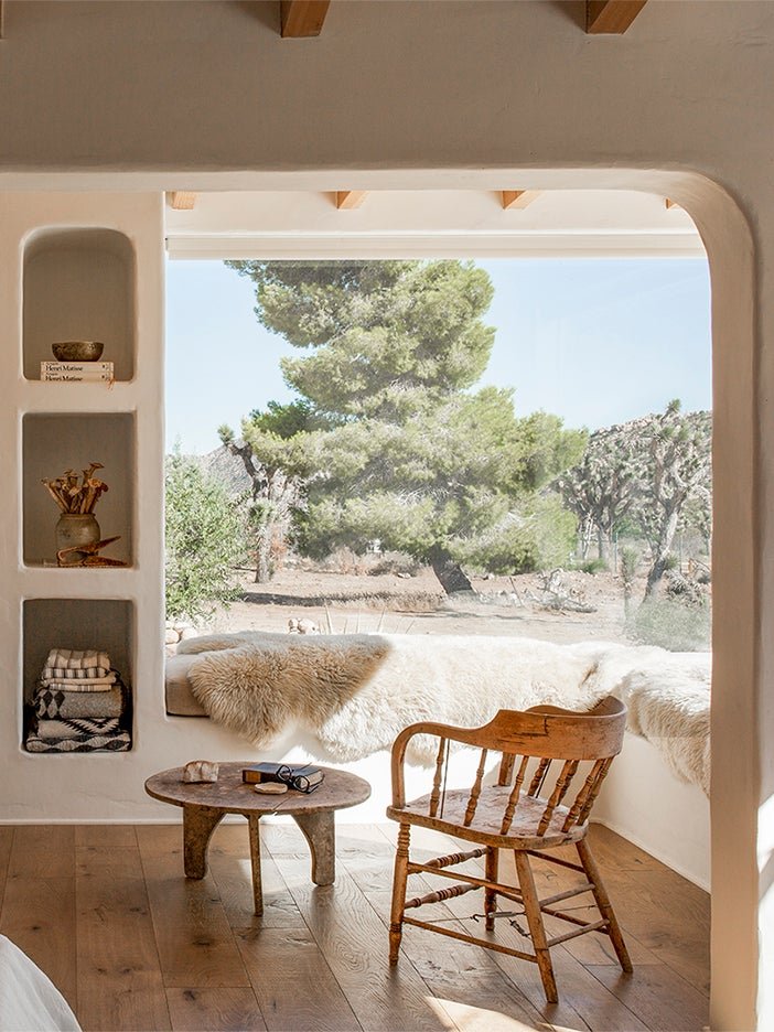 Imperfect Plaster Walls and Built-In Furniture Define This Artful Adobe Reno