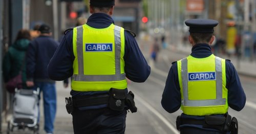 Man found in trailer at a Dublin post centre arrested