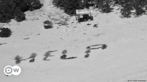 Castaways rescued after writing 'HELP' in palm fronds