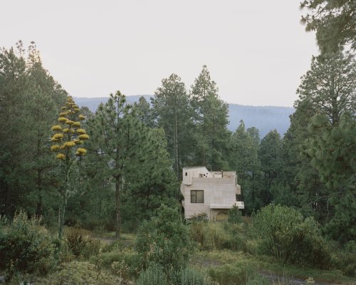 This Board-Formed Concrete “Cabin” Has the Longest Stovepipe We’ve Ever Seen