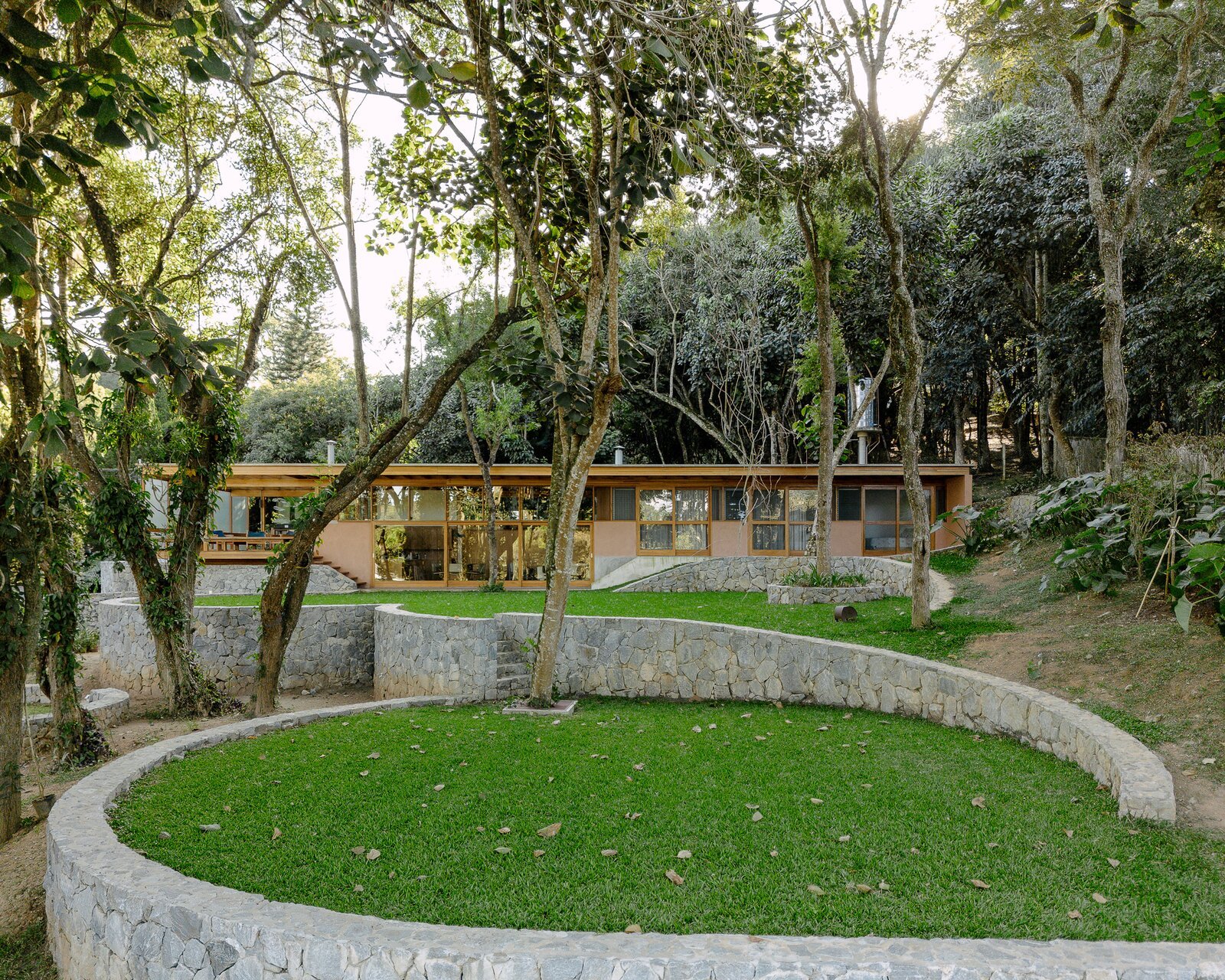 Three Circular Terraces Lift This Brazilian Home Up Amidst the Treetops
