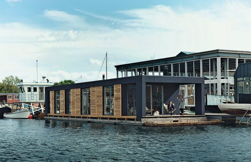 Articles about residents tiny floating home can dive water two feet bed on Dwell.com