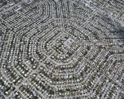 Articles about suburban sprawl photographed above on Dwell.com