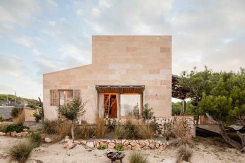 Local Sandstone and Plenty of Pine Keep This Mallorca Beach Home Light and Bright