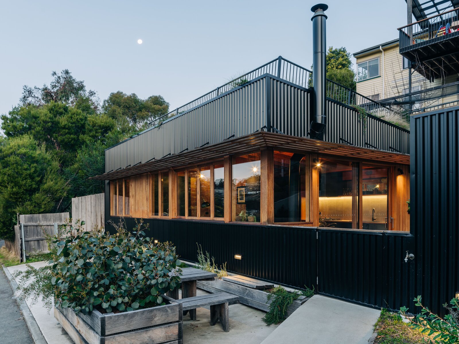 In Tasmania, a Backyard House Built Into the Hillside Provides Space for Visiting Grandparents