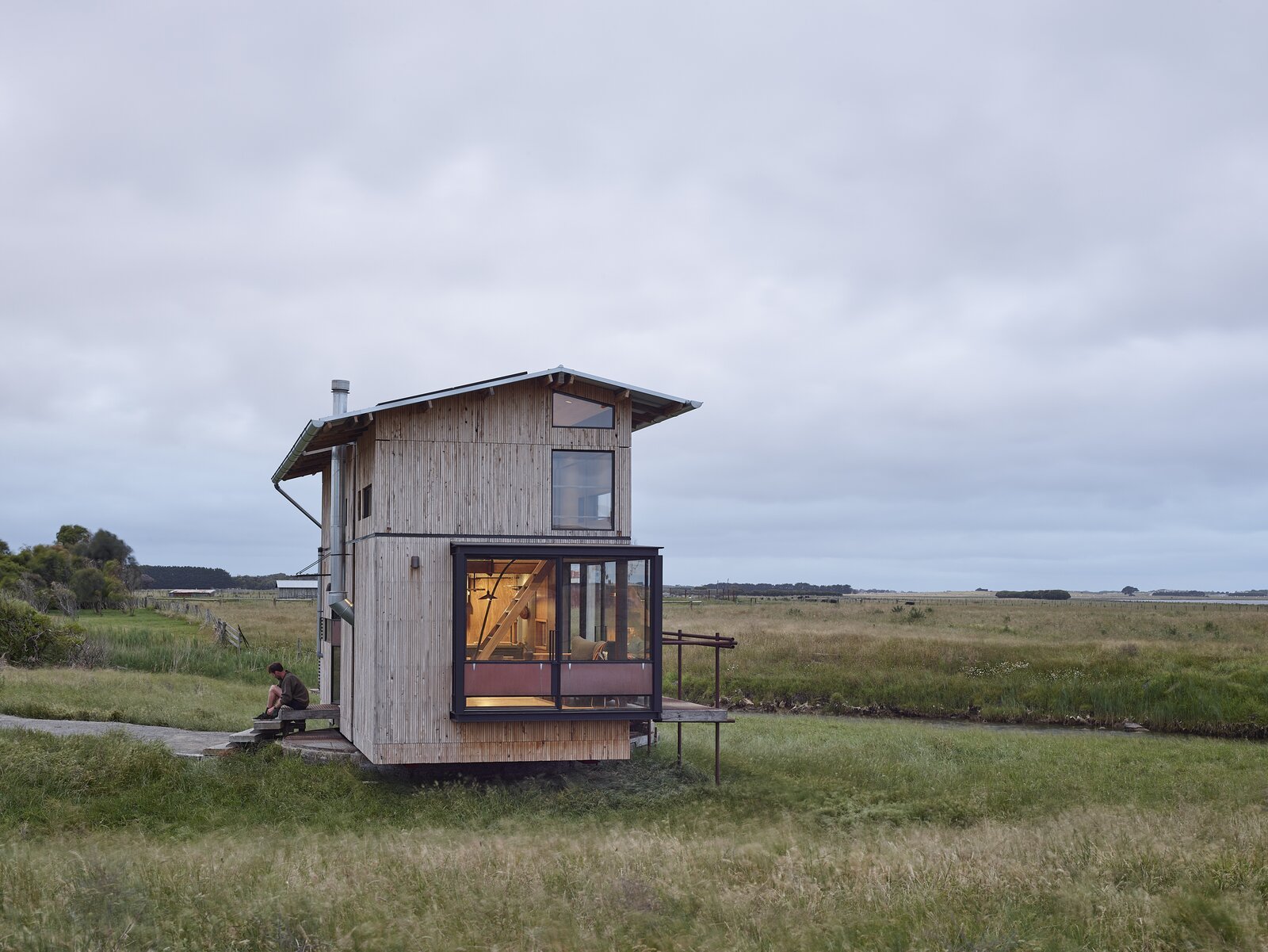 An Australian Tiny Home Built From Recycled Materials Reaches New Heights With an Expandable Roof