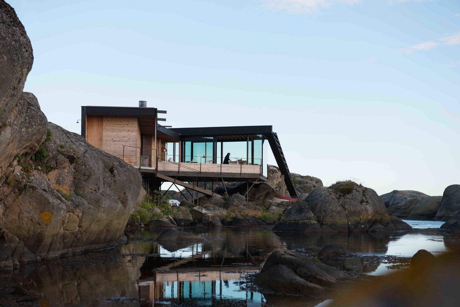 A Norwegian Summer Cabin Embraces the Rocky Terrain