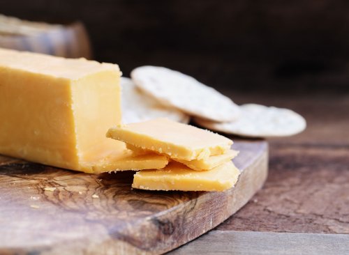 The Biggest Danger Sign You're Eating Too Much Cheese, Says Science
