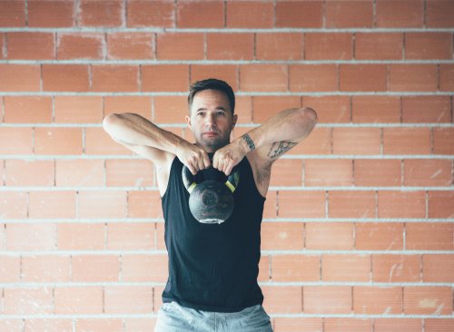 Shrink Your Belly Overhang for Good With This Kettlebell Workout