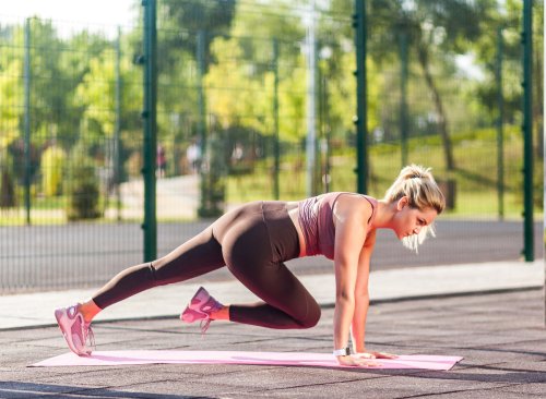 Reduce Your Midsection With These Floor Exercises, Trainer Says