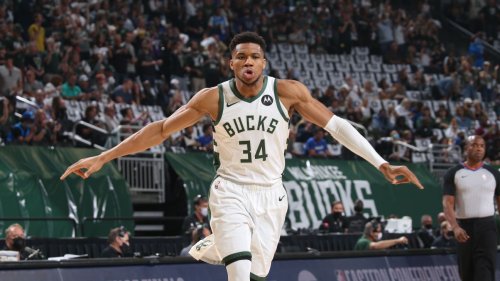 Giannis Antetokounmpo and Milwaukee Bucks spinning and ...