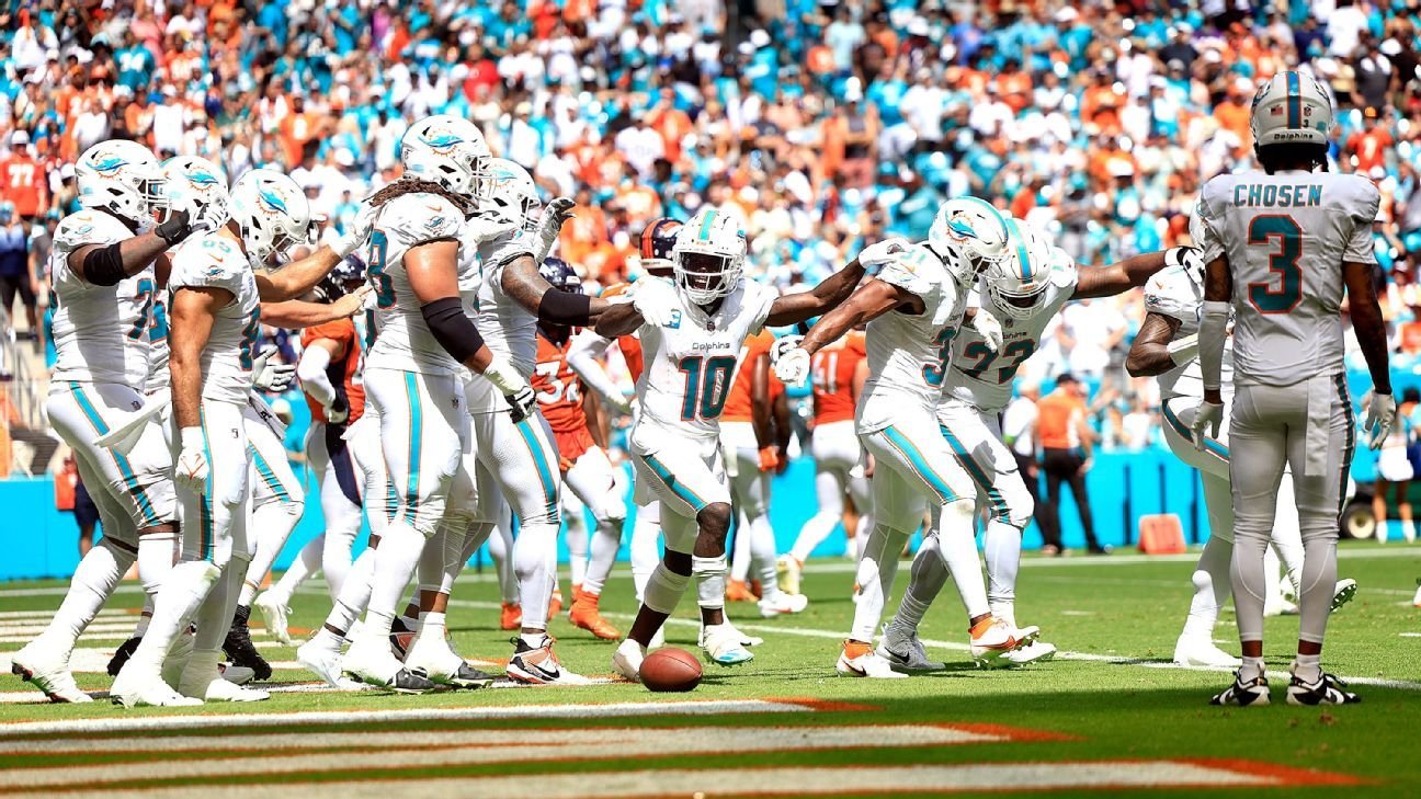 Miami Dolphins score 70 points vs. Broncos in record day