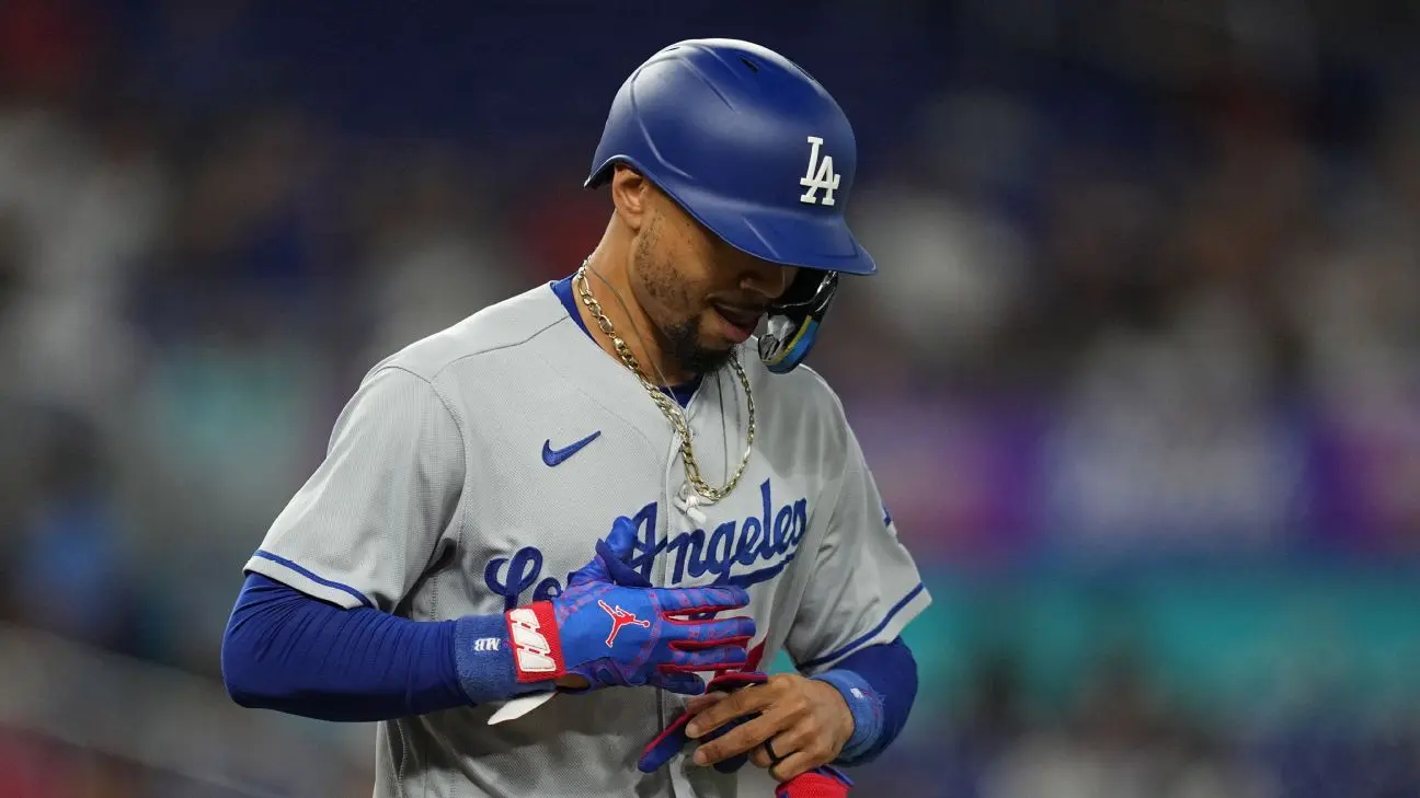 Dodgers moving on, reassign Julio Urias' locker, scrub murals, Sports