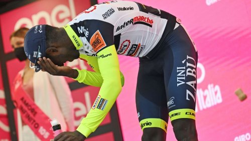 Jubilant Biniam Girmay forced out of Giro d'Italia after wine cork hits eye