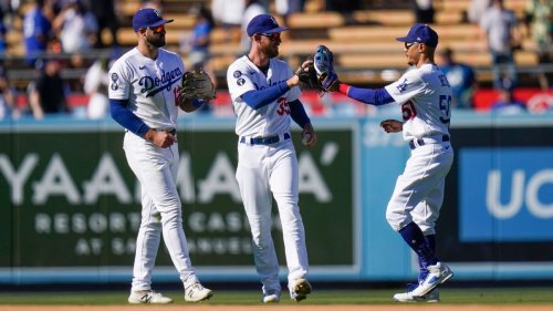 Dodgers clinch top NL seed, tie club wins record