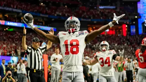 Ohio State Buckeyes receiver Marvin Harrison Jr. wears Louis Vuitton cleats  and an Apple Watch - ESPN