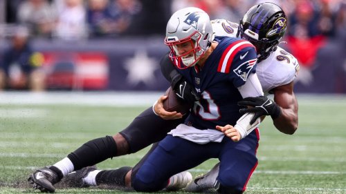 New England Patriots QB Mac Jones suffers leg injury on final pass attempt