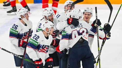 United States edges Austria in overtime, Canada routs Italy at ice hockey world championships