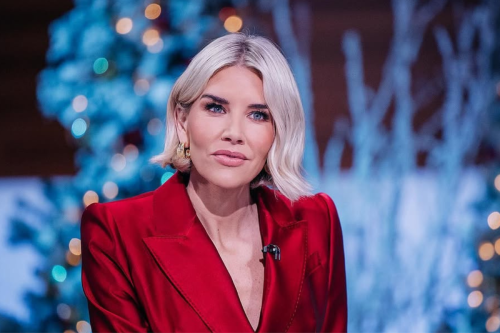 Charissa Thompson Turns Heads in White Bathrobe With $219.5 Billion Queen on Tuesday