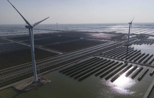 Britain's energy minister visits China to discuss climate and energy cooperation