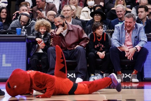 Drake Stops His Son Adonis From Eating All The Candy In Sweet Moment At Toronto Raptors Game