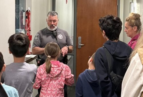 Eugene Police welcome charter school students for behind-the-scenes visit