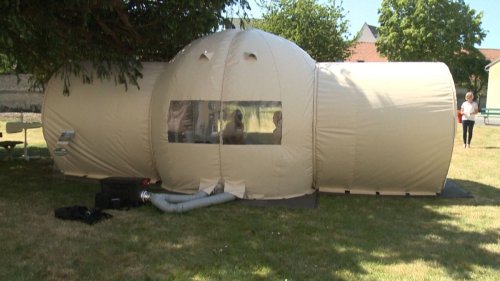 Video. French nursing home's special tent lets elderly have visitors again