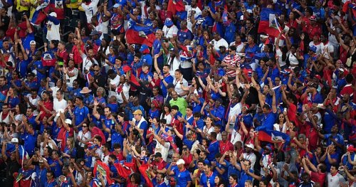 Brazil and Haiti fans celebrate together after World Cup match