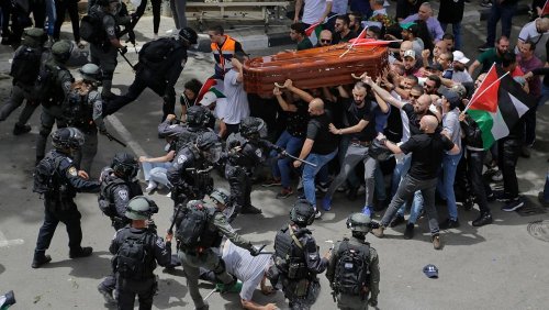 Israel police beat pallbearers at Al Jazeera journalists's funeral