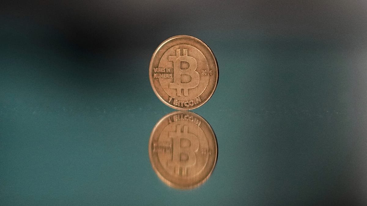 Bitcoin falls to $61,000, down more than 25% this month as long-term holders sell