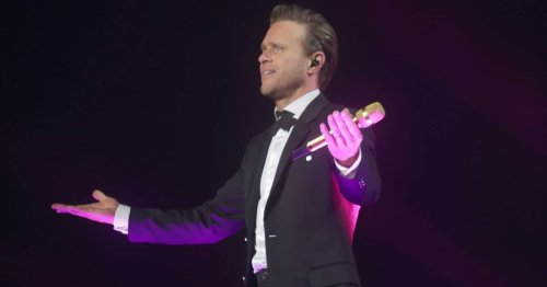 Olly Murs booed on stage at UK gig as he makes awkward admission and asks 'shall I go?'