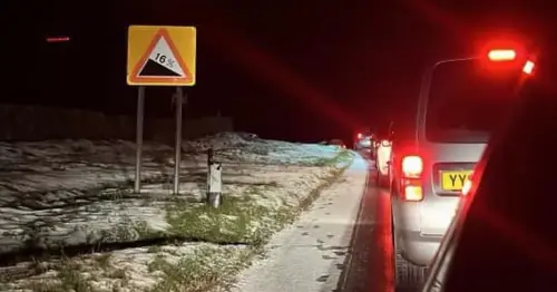 Snow chaos with 100 drivers stranded on freezing Yorkshire road as police issue warning