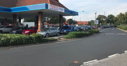 Dad running fumes blasts 'idiots' panic buying at petrol station