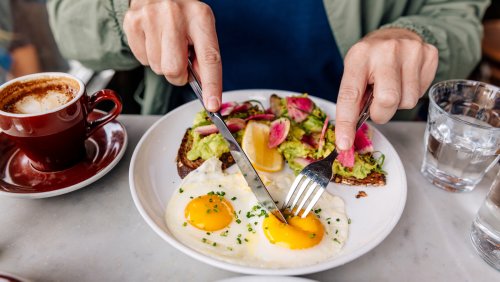 Why Solo Travelers Eating Alone Don't Always Feel Very Welcome At Fine Dining Restaurants